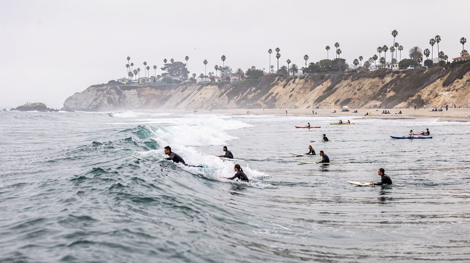 Surfing and Kayaking Along Laguna Beach's Coves